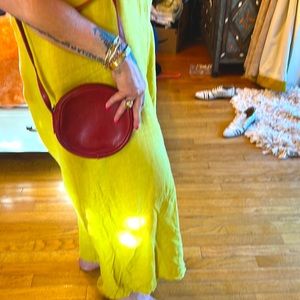 Italian leather, perfect size for phone, lipgloss, ID, sunnies. Rich red.